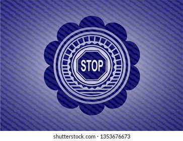 stop icon inside badge with denim background