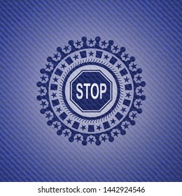 stop icon inside badge with denim texture