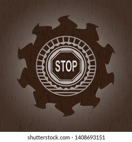 stop icon inside badge with wood background