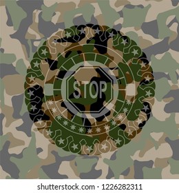 stop icon inside camouflaged emblem