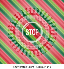 stop icon inside christmas badge.