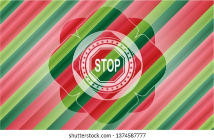 stop icon inside christmas colors style badge.