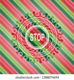 stop icon inside christmas colors badge.