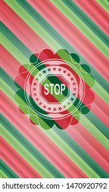 stop icon inside christmas colors emblem.
