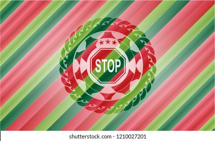 stop icon inside christmas emblem.