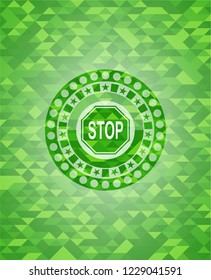 stop icon inside green emblem with mosaic ecological style background