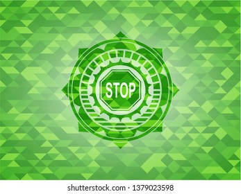 stop icon inside green emblem with mosaic ecological style background