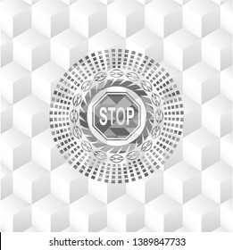 stop icon inside grey badge with geometric cube white background