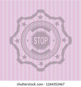 stop icon inside pink emblem