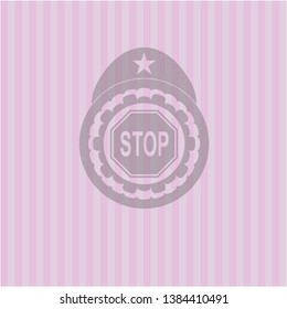 stop icon inside pink emblem