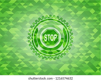 stop icon inside realistic green mosaic emblem