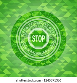 stop icon inside realistic green mosaic emblem