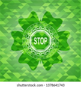 stop icon inside realistic green mosaic emblem