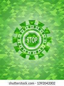 stop icon inside realistic green mosaic emblem