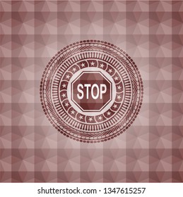 stop icon inside red seamless badge with geometric pattern.