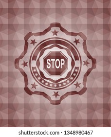 stop icon inside red seamless emblem or badge with geometric pattern background.