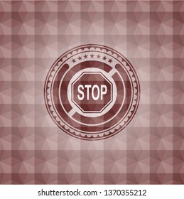 stop icon inside red seamless emblem or badge with geometric pattern background.