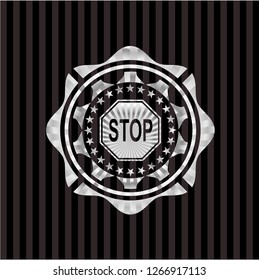 stop icon inside silver emblem or badge