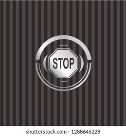 stop icon inside silver emblem