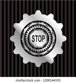 stop icon inside silvery badge or emblem
