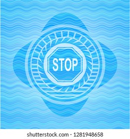 stop icon inside water wave emblem.