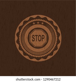 stop icon inside wood badge or emblem