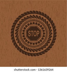 stop icon inside wooden emblem. Vintage.