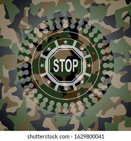 stop icon on camouflage pattern