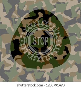 stop icon on camouflage texture