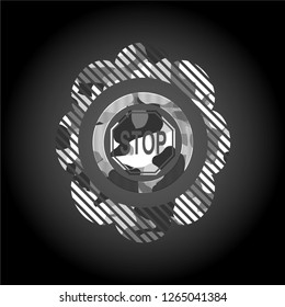 stop icon on grey camo pattern