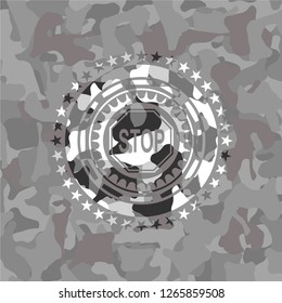 stop icon on grey camo pattern