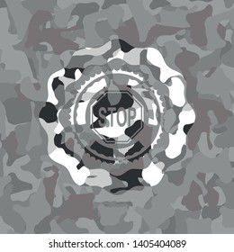 stop icon on grey camouflage texture