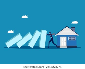 Stop the real estate crisis. Businessman pushes falling dominoes to protect the house