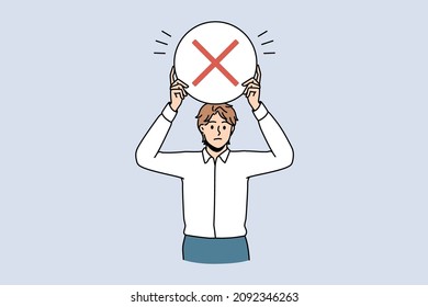 Stop and reject sign concept. Young frustrated serious man worker standing holding round red rejecting denying stop sign in hands vector illustration 