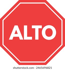 Stop sign in Spanish . ALTO Mexican stop sign . Spanish traffic sign . ALTO sign