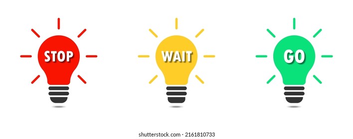 Stop, wait, and go color icons. Green Yellow and Red light bulbs with lettering. Flat vector illustration.
