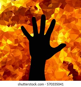 Stop war. Stopping silhouette of the human hand on the background of a burning war.