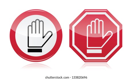 Stop warning road sign with hand