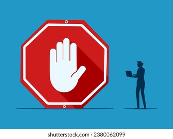 Stop working. Businessman makes decision with stop sign