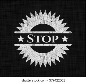 Stop written on a chalkboard