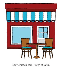 store building front with chairs and table