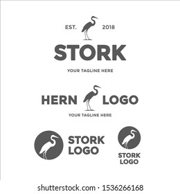 Stork, hern, heron or ibis logo set in vintage or retro style. Stork silhouette logo. Eps10.