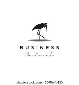 stork logo design is standing on the lake