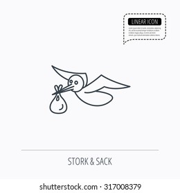 Stork with sack icon. Newborn baby symbol. Linear outline icon. Speech bubble of dotted line. Vector