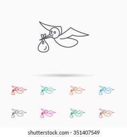 Stork with sack icon. Newborn baby symbol. Linear icons on white background.