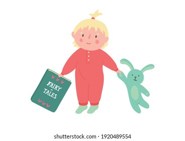Storytime. Baby wants to read fairy-tales to her toy. Cute child in sleepsuit plays with book and rabbit.