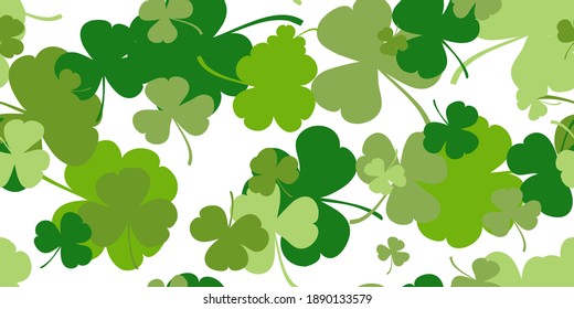 St.Patrick' s day. Green clover leaves random falling on white background. Seamless looped video with green elements. Shot in 4k resolution with 60 Frame per second