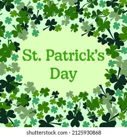 St.Patrick 's Day. Greeting card with a background of green clover leaves.