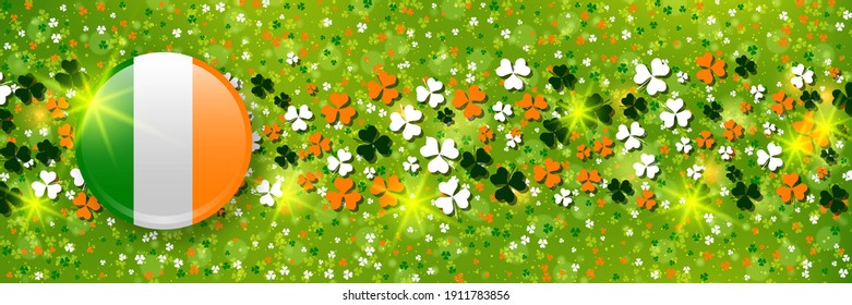 St.Patrick's Day green blurred vector background with colorful clover leaves