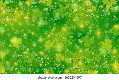St.Patrick's Day green vector background with clover leaves and bokeh effect